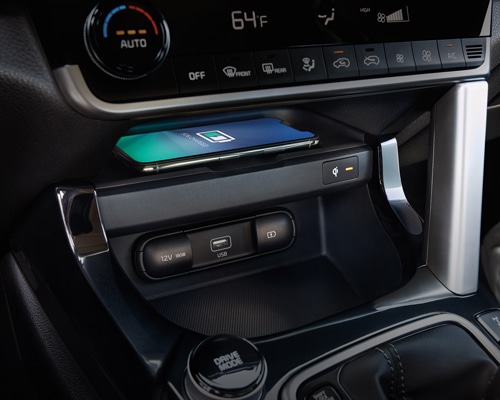 2021 Kia Seltos Wireless Charging Available wireless phone charger means you can simply place your compatible device on the charging pad for cord-free power on the go.